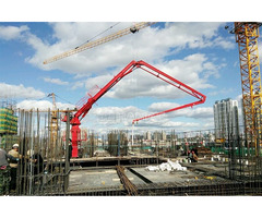 SELF-CLIMBING CONCRETE PLACING BOOM