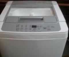 BRAND NEW LG TOP LOAD WASHING MACHINE FOR SALE